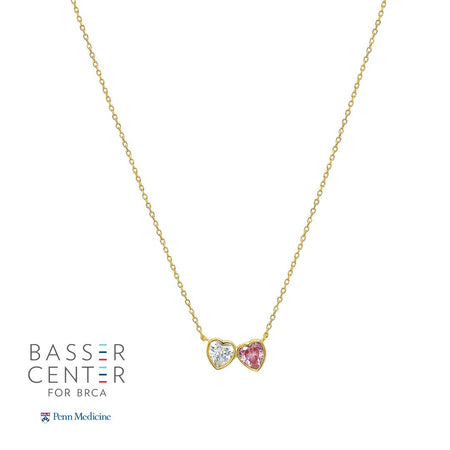 White and Pink CZ Double Heart Bezel Necklace  Yellow Gold Plated 13.5 - 18" Necklace Length  0.54" Length by 0.28" Width of Both Hearts