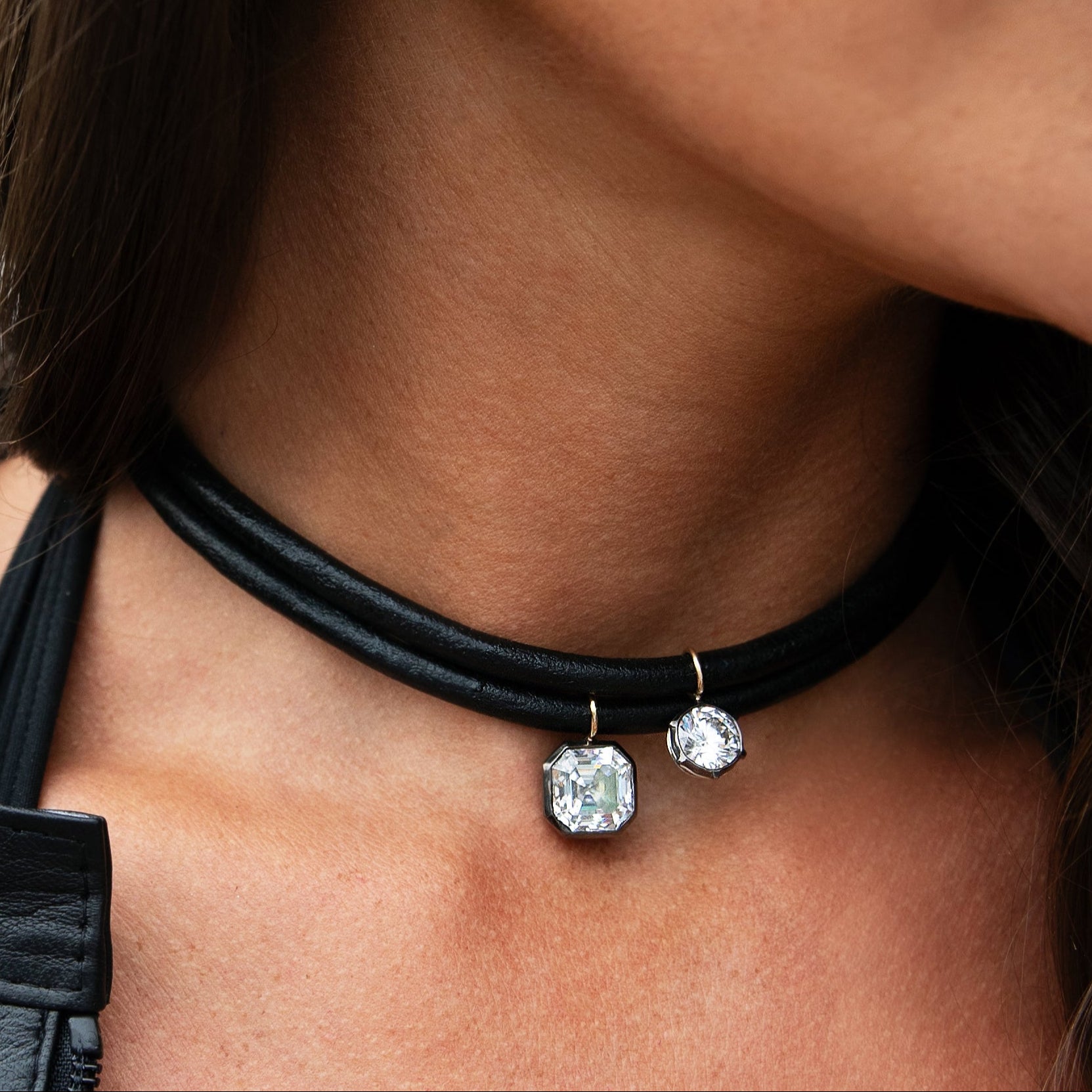 Asscher CZ Black Leather Cord Choker Necklace

Elevate your style with this sophisticated leather cord choker necklace. Its sleek design offers a unique, on-trend accessory that complements both casual and elegant outfits, adding a subtle edge to your look. Perfect for those who appreciate minimalist yet distinctive jewelry.

White, Yellow &amp; Oxidized Plating Over Silver
Bail: 14K Yellow Gold
Asscher CZ: 12MM Stone
13-15" Adjustable Length