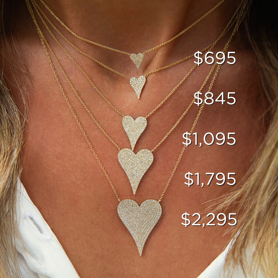 Diamond Small Heart Necklace

Sparkle up your style with our Small Diamond Heart Necklace! This staple piece features shimmering diamonds on a classic heart pendant, perfect for adding a touch of elegance to any outfit. A must-have for any jewelry collection!

14K White Gold
0.14 Diamond Carat Weight
Chain: 15.5-17.5" Length
Heart: 0.41" Long X 0.30" Wide

Shop all sizes &amp; colors of this necklace here.