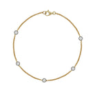 Diamond Station Bracelet

A delicate everyday essential, this 14K yellow gold diamond-by-the-yard bracelet features five sparkling round diamonds set along a fine gold chain. Perfect for wearing solo or layering with your favorite bracelets for an effortless, timeless look.

14K&nbsp;Yellow Gold
0.43 Diamond Carat Weight
7" Length
