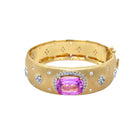 Pink Sapphire &amp; White Topaz Bangle Bracelet

Yellow Gold Plated Over Silver&nbsp;
Cushion Cut Lab Pink Sapphire
0.76" Wide