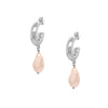 These exquisite hoops feature a stunning light pink pearl elegantly set in your choice of yellow or white gold plating, embodying the essence of elegance and hope. These gorgeous earrings perfectly complement any ensemble, making them a versatile addition to your jewelry collection.  Pink Pearl Drop on Small Hoop Pieced Earrings  Yellow or White Gold Plating Faux Light Pink Pearl 1.75" Long X 0.42" Wide As worn by Kyle Richards.