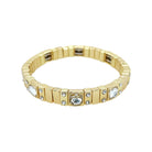 Gold bracelet with embedded crystals on a white background