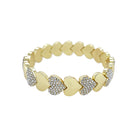 Gold bracelet with heart-shaped links on a white background