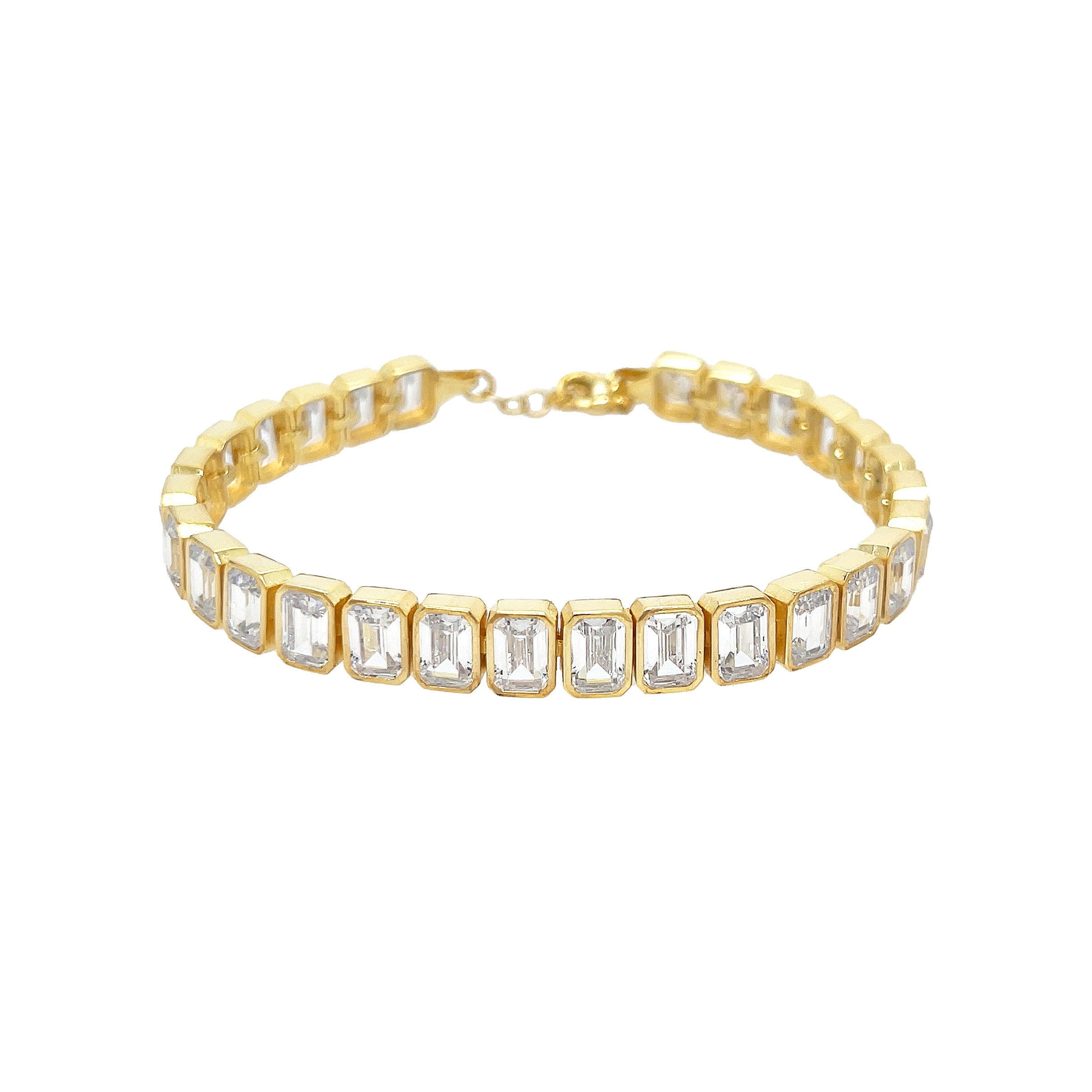 <p>Crystal Octagon Tennis Bracelet&nbsp;</p> <ul> <li>Yellow Gold Plated Over Silver&nbsp;</li> <li>Cubic Zirconia</li> <li>6.75" -7.75" Adjustable Length&nbsp;</li> </ul>