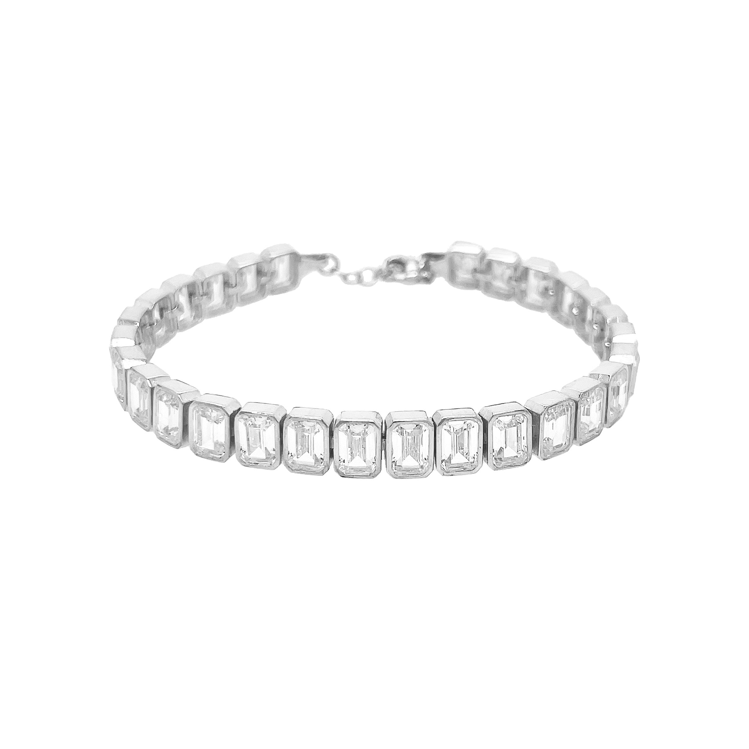 <p>Crystal Octagon Tennis Bracelet&nbsp;</p> <ul> <li>White Gold Plated Over Silver&nbsp;</li> <li>Cubic Zirconia</li> <li>6.75" -7.75" Adjustable Length&nbsp;</li> </ul>