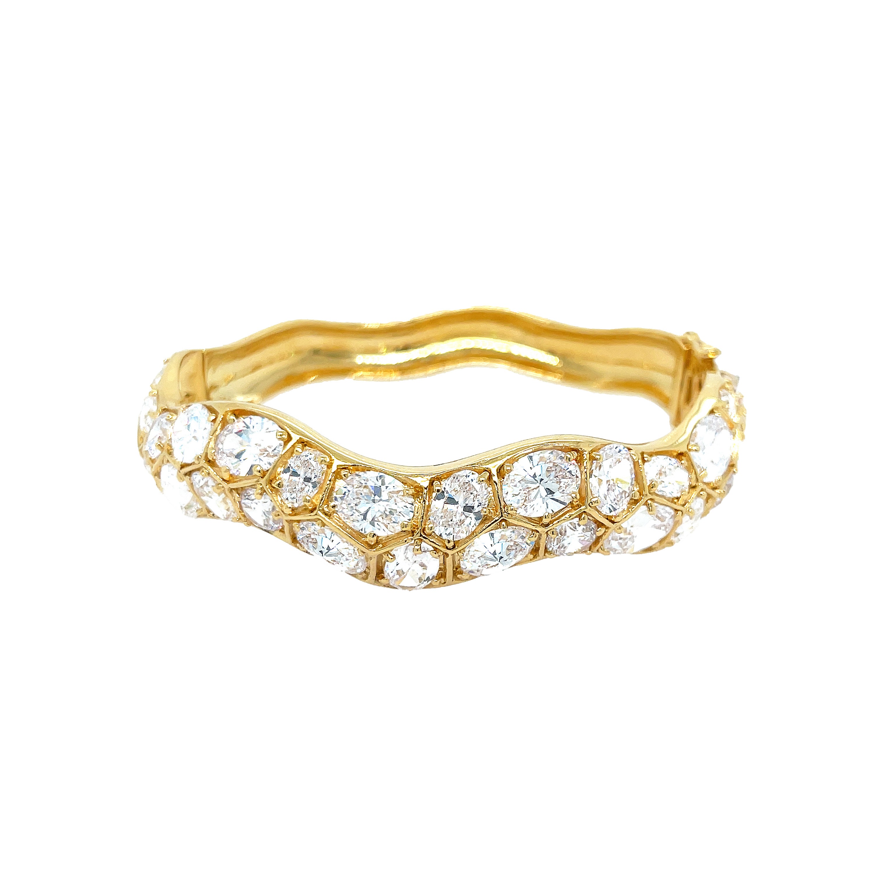 <p>CZ Cluster Wave Bangle Bracelet</p> <ul> <li>Yellow Gold Plated</li> <li>0.75" Wide</li> </ul>