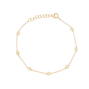 14K Gold Diamond Bezel Bracelet  14K Yellow Gold 0.15 Diamond Carat Weight Bezel: 3.25 MM Diameter Chain: 6-7" Length