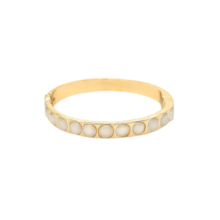 <p>Ivory Round Stone Bangle Bracelet</p> <ul> <li>Yellow Gold Plated</li> <li>0.29" Wide</li> </ul>