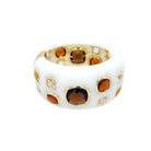 White, Yellow &amp; Brown Multi-Shape Bangle Bracelet

Elevate your look with this White Bangle Bracelet, a sophisticated accessory that blends modern design with bold style. Its multi-shape stones create a striking statement piece, perfect for adding a trendy edge to any outfit.&nbsp;

Yellow Gold Plated
1.63" Wide&nbsp;