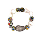 Multi-Color Bead &amp; Pearl Stretch Bracelet

Diamond Roundelle Bead
Oxidized CZ Center Bead
African Beads
Baroque Pearls