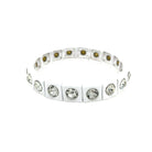 Bracelet with clear gemstones on a white background