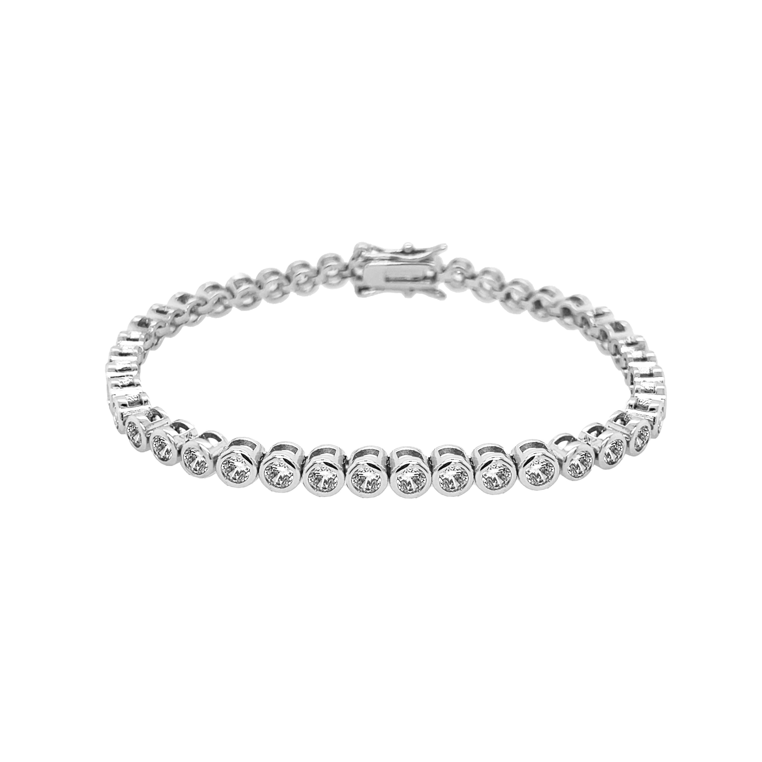 Round CZ Bezel Tennis Bracelet

White Gold Plated
0.16" Thick
6.5" Long