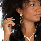 Multi Circle Drop Pierced Earrings

These Multi Circle Earrings are a must-have accessory for any fashion-forward individual. With their unique design and statement-making appeal, they are sure to elevate any outfit.

Yellow Gold Plated
3.20" Long X 1.90" Wide