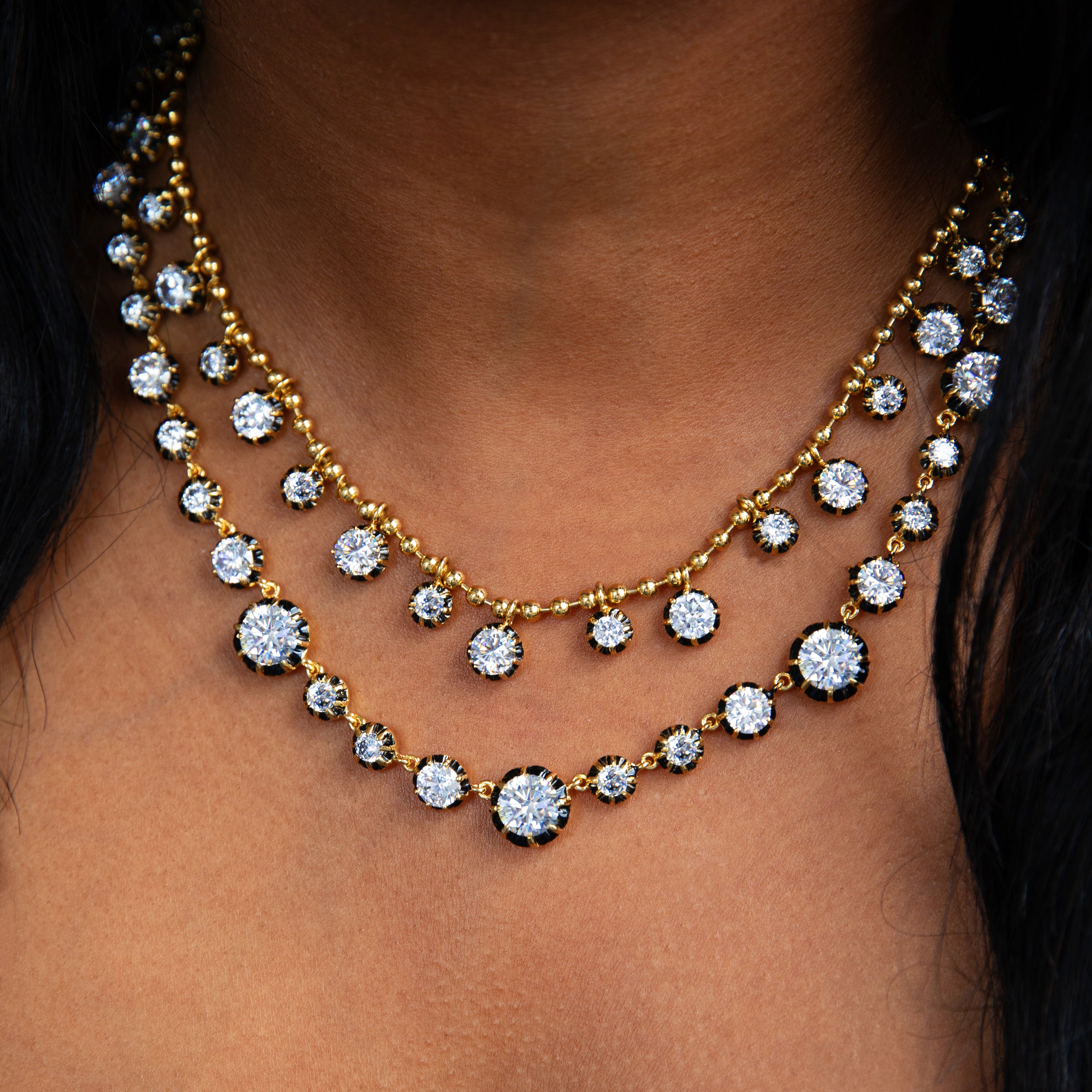 Small CZ Stone Necklace

This Small Stone Necklace features an organic shape that adds a unique touch to your jewelry collection. Its distinctive design offers a subtle yet striking sparkle, making it a refined statement piece for everyday elegance.

Yellow Gold &amp; Oxidized Plating Over Silver
CZ Stones: 4, 6 &amp; 8MM
16.5-19" Adjustable Length