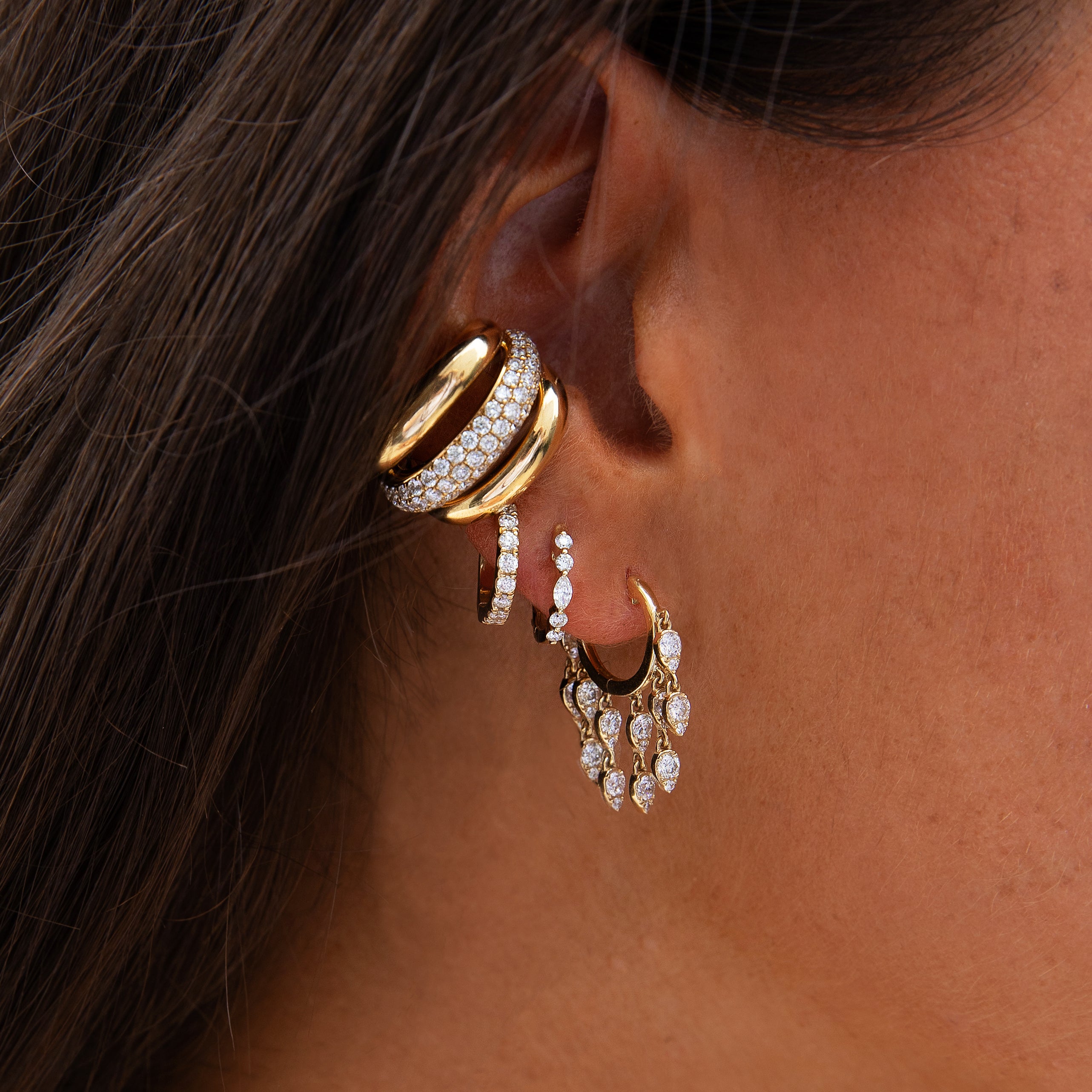 Diamond Dangle Huggie Pierced Earrings

Add a touch of elegance to your look with our Diamond Dangle Huggie Earrings. Crafted with exquisite diamonds, these huggie earrings feature a sophisticated dangle design that adds a subtle touch of luxury to any outfit.&nbsp;

14K Yellow Gold
1.11 Diamond Carat Weight
0.90" Long X 0.10" Wide