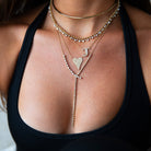 Round &amp; Pear Shaped Diamond Lariat Necklace&nbsp;

14K Yellow Gold
Pear: 1.10 Diamond Carat Weight
Round: 0.85 Diamond Carat Weight
16"-18" Adjustable Length&nbsp;
