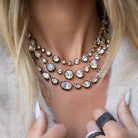 This Small Stone Necklace features an organic shape that adds a unique touch to your jewelry collection. Its distinctive design offers a subtle yet striking sparkle, making it a refined statement piece for everyday elegance.