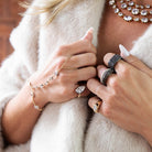 Multi-Shape Hand Chain Bracelet

14K Yellow &amp; White Gold
11 Cubic Zirconia Stones
7" Length

Due to popular demand, please allow up to 3 weeks for delivery.