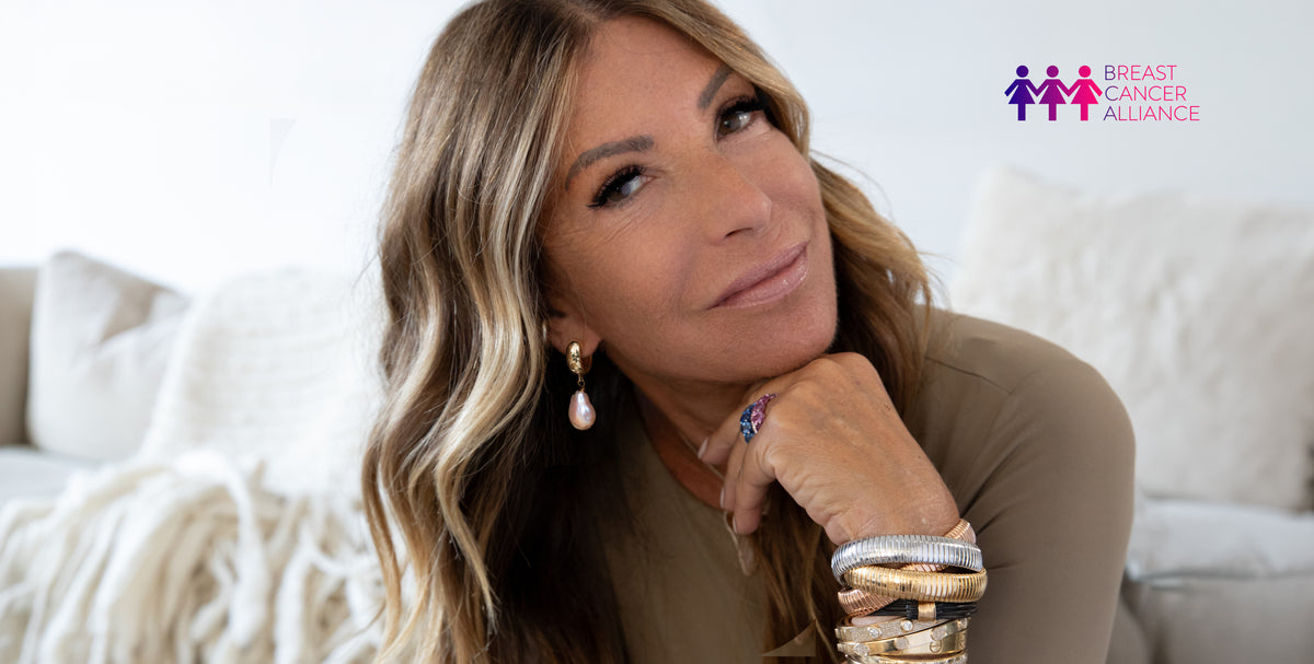 Jennifer miller wearing 2026 hope hoop earrings created to support the breast cancer alliance.