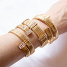 Thin Flex Wrap Bracelet  Yellow Gold Plated  2.50" Diameter 0.38" Wide    While supplies last. All Deals Of The Day sales are FINAL SALE.