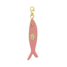 Pink fish-shaped charm with gold accents 