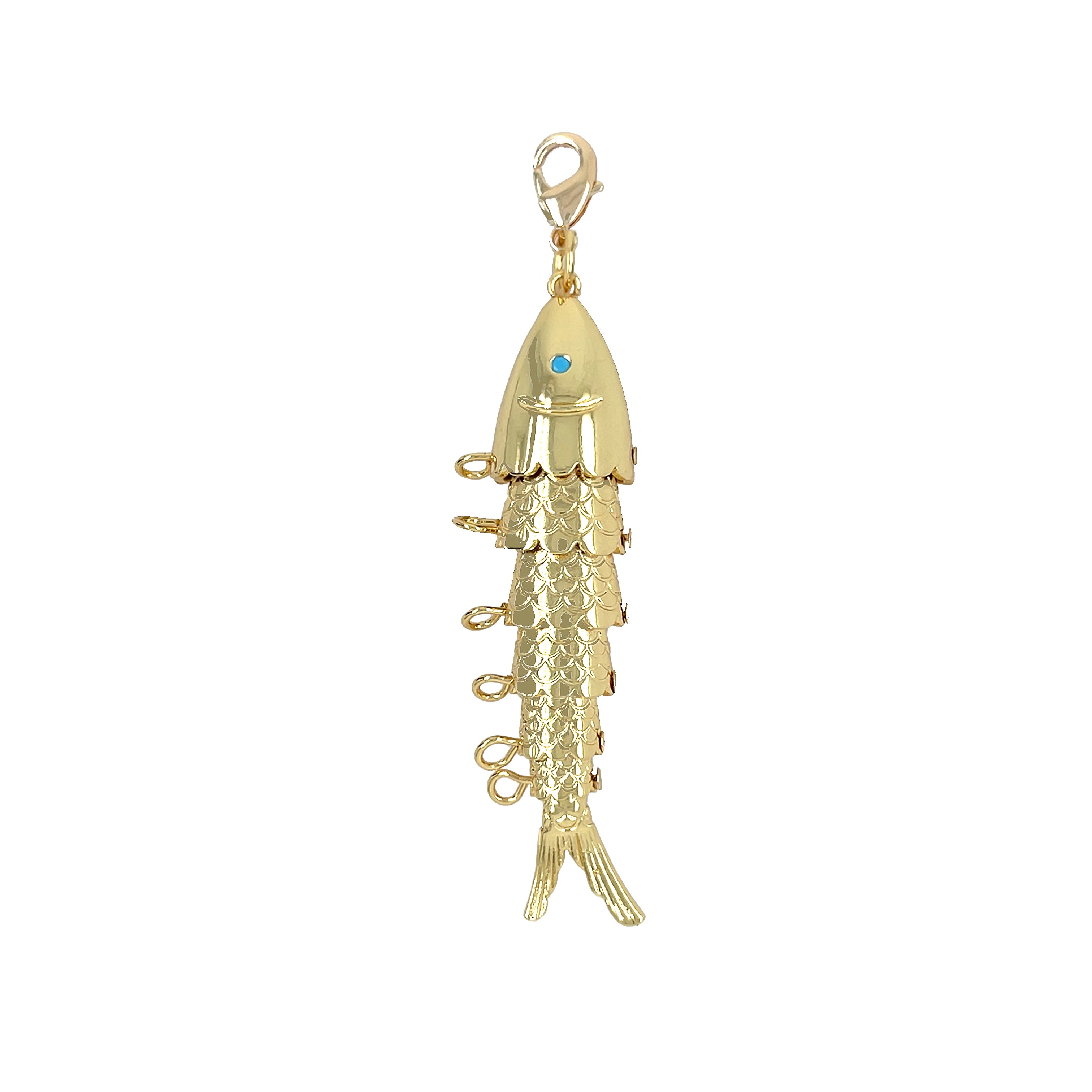 Large Textured Flex Turquoise Eye Fish Charm&nbsp;

Reel in some fun with our Flex Fish Charm! This flexible and texturized charm adds a playful touch to any accessory. No need to fish for compliments, they'll come swimming your way with this cute addition.

Yellow Gold Plated
2.5" Long x 0.66" Wide