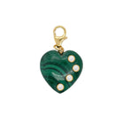 Malachite Bezel Heart Charm

This Malachite Heart Charm features rich green malachite with bezel-set cubic zirconia accents for a subtle sparkle. Finished in yellow gold plating, it adds a bold and timeless touch to any charm stack.

Yellow Gold Plated
1.28" Long X 0.76" Wide
Cubic Zirconia&nbsp;
Malachite