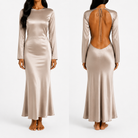 Beige Satin Crepe Long Sleeve Backless Dress

Elegant and effortless, this satin crepe maxi dress features long sleeves, a sleek silhouette, and a dramatic open back design with a delicate tie closure. Perfect for special occasions and evening events.

One Size
100% Satin
Hand Wash In Lukewarm Water