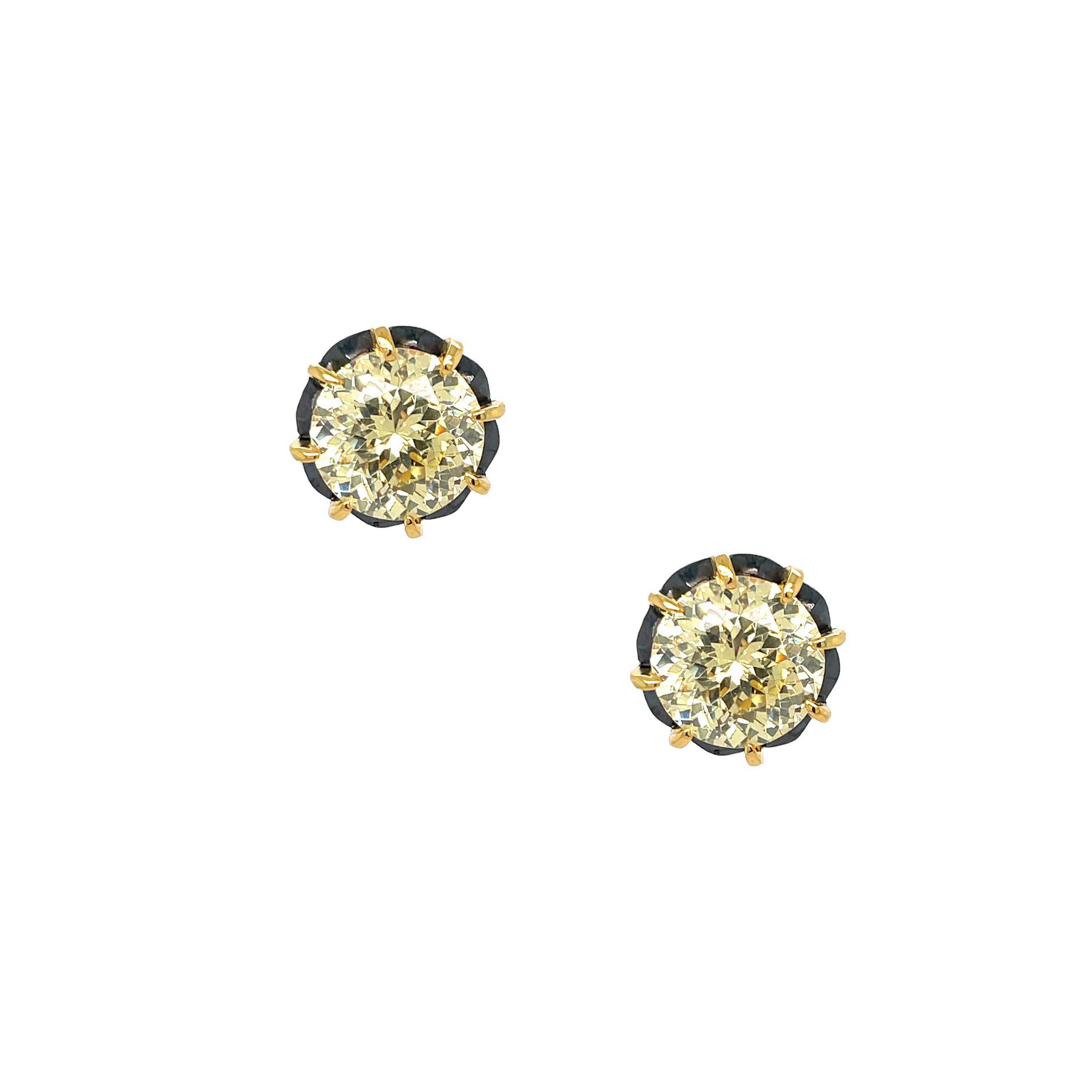 Canary CZ Stud Pierced Earrings

Yellow Gold &amp; Oxidized Plating
Cubic Zirconia
10MM
0.48" Wide