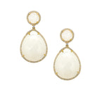 White Domed Teardrop Pierced Earrings

Elevate your style with our White Teardrop Earrings by Jennifer Miller. These stunning earrings feature a delicate teardrop design in a luxurious white hue. Perfect for any occasion, they add a touch of elegance and sophistication to any outfit. Step into the world of refined fashion with these exclusive earrings.

Yellow Gold Plated Over Silver
White&nbsp;Chalcedony
Pave CZ Border
1.75" Length X 0.90" Width
