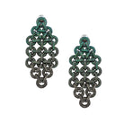A pair of large, dangling statement earrings featuring an intricate, interlocking circular link design. The links are textured with a dark, metallic bronze finish and heavily accented with shimmering green glitter, set against a plain white background.