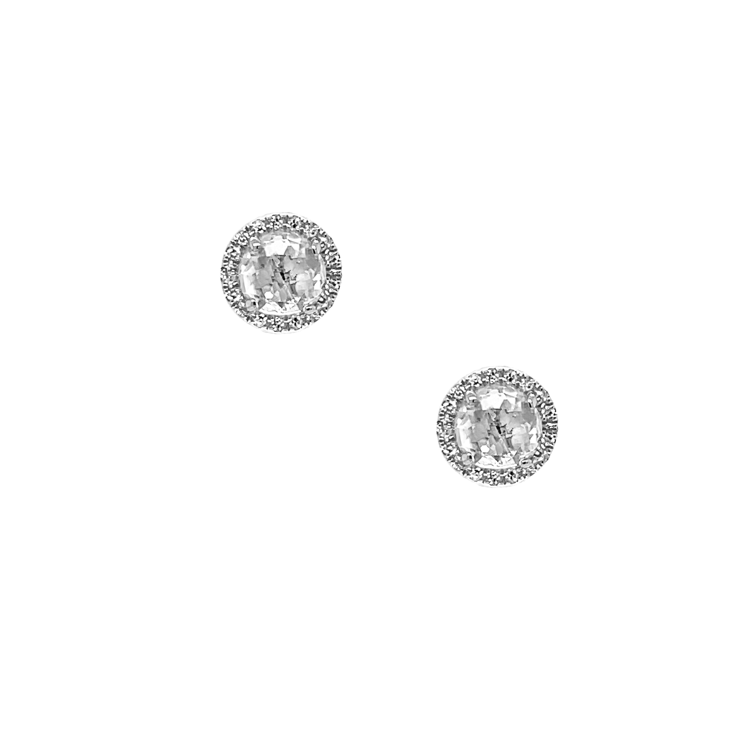 Diamond &amp; Topaz Round Stud Pierced Earrings

14K White Gold
0.08 Diamond Carat Weight
0.27" Wide