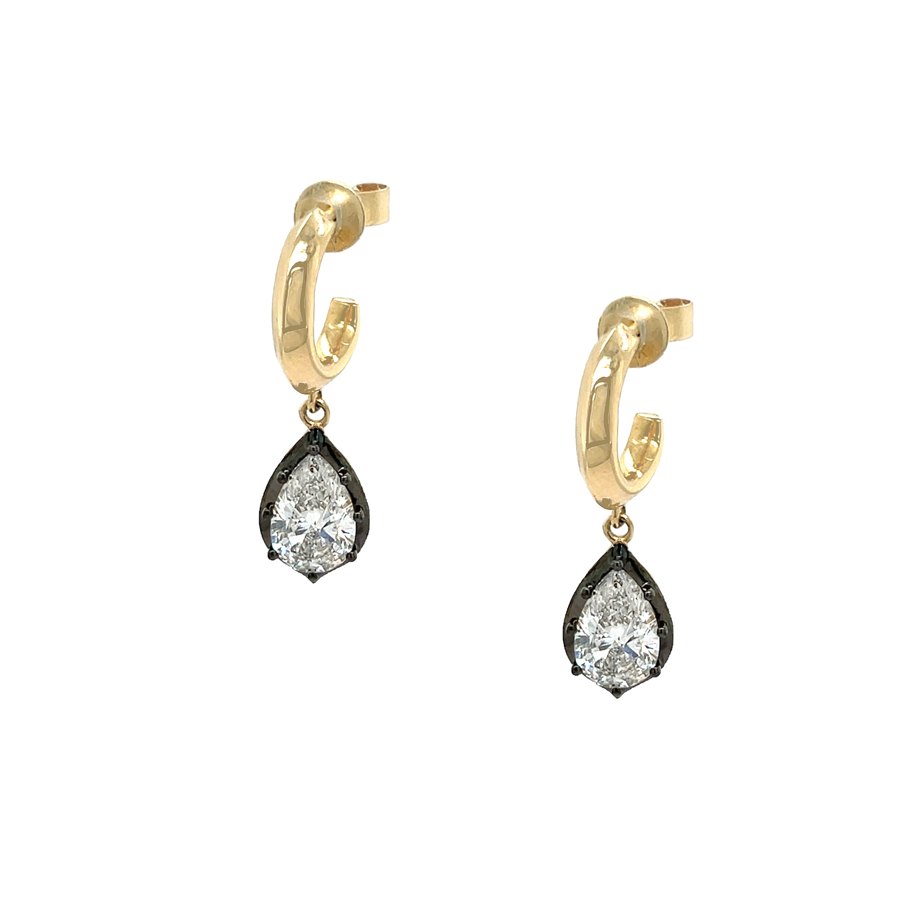 Lab Diamond Emerald Cut &amp; Round Drop Pierced Earrings

These lab diamond huggie earrings seamlessly transition from day to night, offering both comfort and elegance. The secure closure ensures they stay perfectly in place throughout your day, while the multi-shape diamond design delivers undeniable sophistication. Wear them as a standalone statement or pair with our 14K Gold Faux Diamond Studs to create a personalized ear aesthetic party.

14K Yellow &amp; Oxidized Gold

2 Diamond Carat Weight
Color FG
