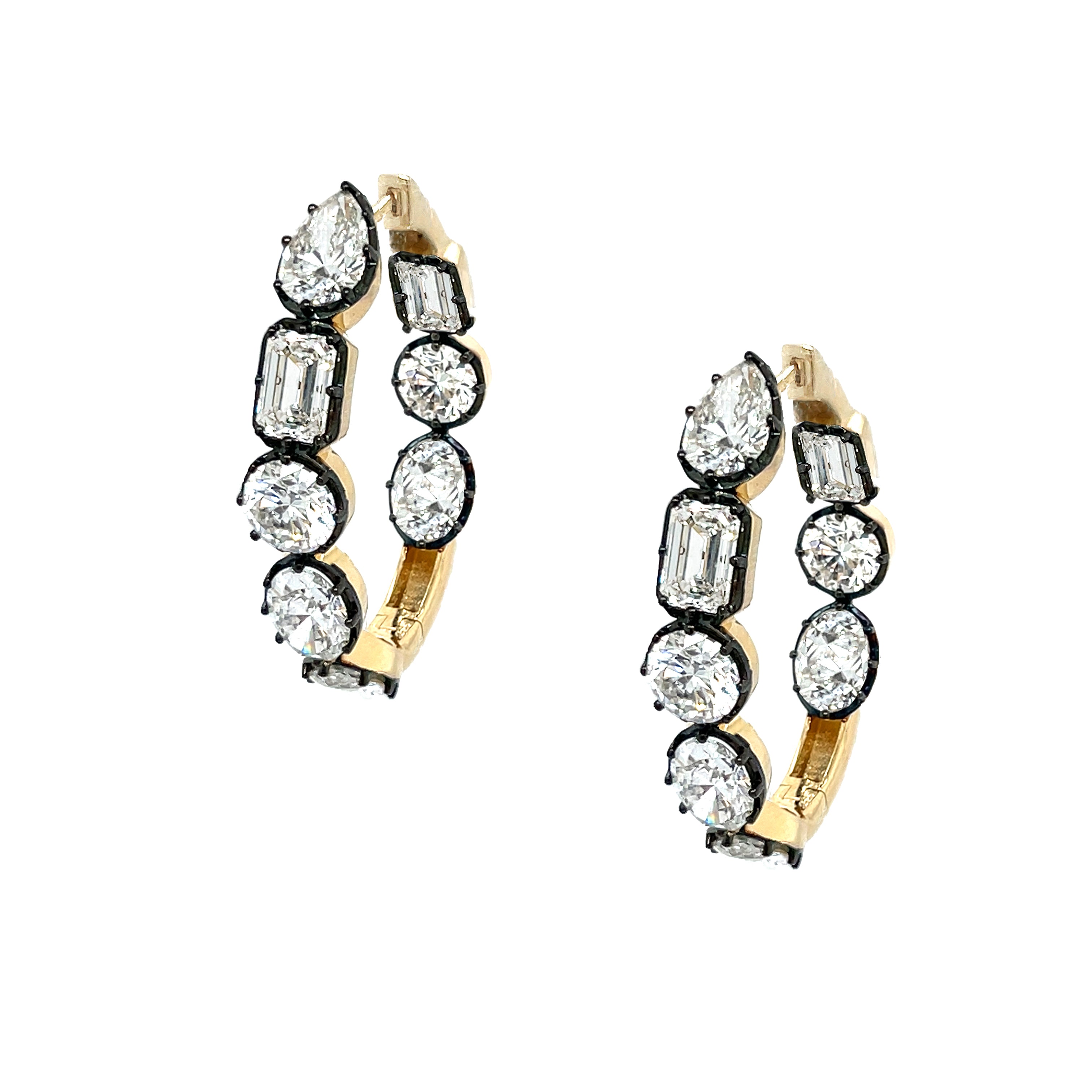 Gold hoop earrings with diamond accents on a white background