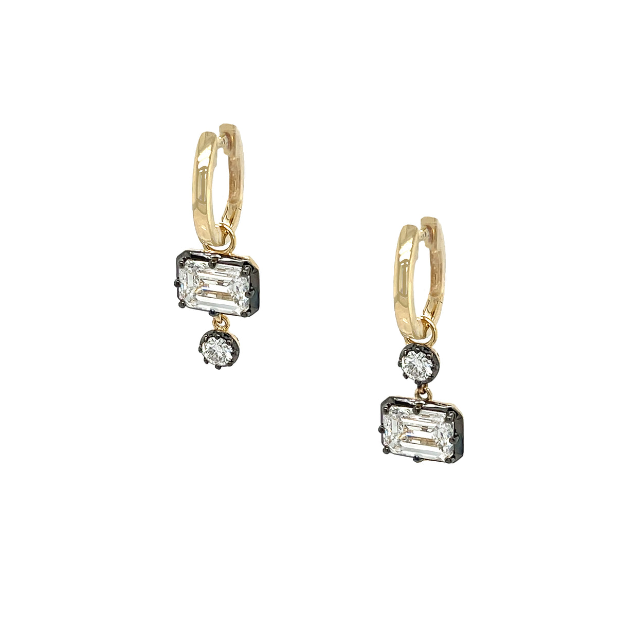Lab Diamond Emerald Cut &amp; Round Drop Pierced Earrings

A modern take on everyday sparkle. Set in 14K yellow gold, these huggie earrings feature a sleek baguette-cut stone paired with a round drop accent for subtle movement and contrast. Set with shimmering lab diamonds, the silhouette feels playful yet easy to wear. Perfect for elevating casual looks or adding a refined finish to evening styling.

14K Yellow &amp; Oxidized Gold

2.20 Lab Diamond Carat Weight
0.92" Long X 0.32" Wide
Color FG
VS Clarity