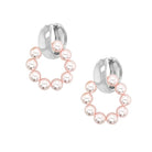 Pink Pearl Hoop Huggie Pierced Earrings

Elevate your ear party with our Pearl Hoop Huggie Earrings, where timeless elegance meets contemporary design. These refined hoops showcase luminous pink pearls gracefully suspended from polished gold hoops, featuring an innovative removable huggie that offers multiple styling possibilities. Perfect for anyone who appreciates versatility without compromising on sophistication.

Available in yellow gold and white gold plated over silver
Huggie: 0.50" Wide
Pearl Hoop: 