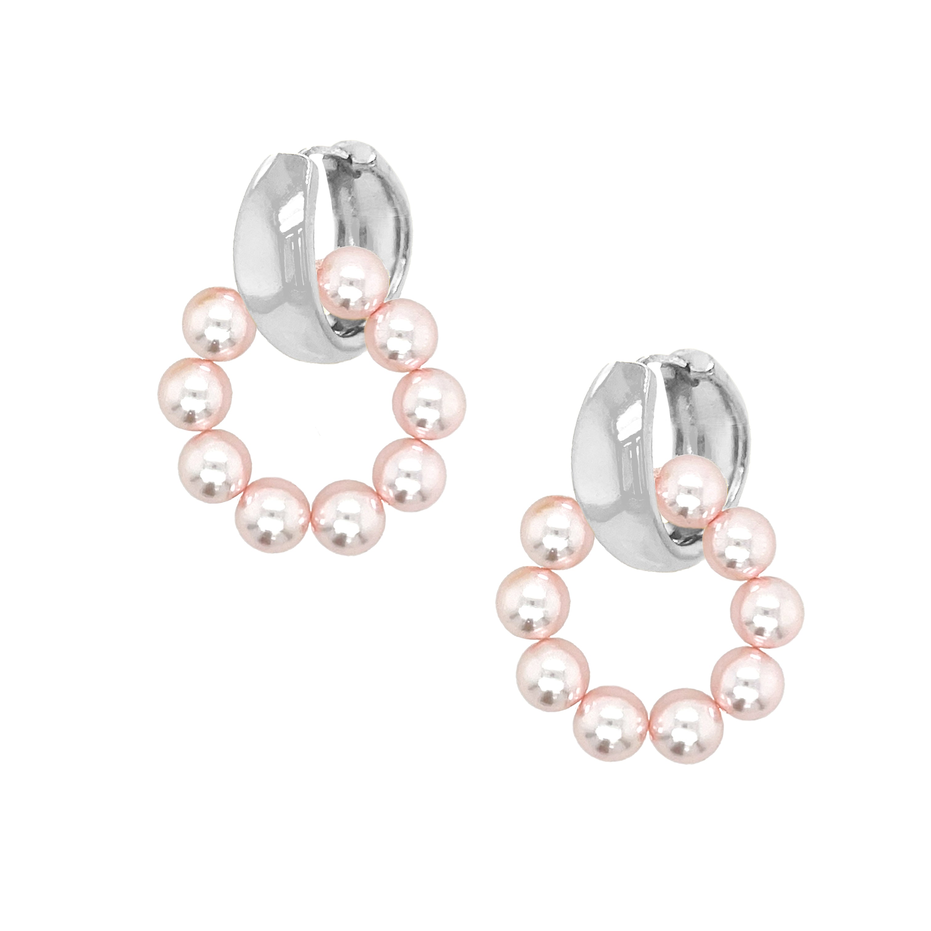 Pink Pearl Hoop Huggie Pierced Earrings

Elevate your ear party with our Pearl Hoop Huggie Earrings, where timeless elegance meets contemporary design. These refined hoops showcase luminous pink pearls gracefully suspended from polished gold hoops, featuring an innovative removable huggie that offers multiple styling possibilities. Perfect for anyone who appreciates versatility without compromising on sophistication.

Available in Yellow &amp; White Gold Plated Over Silver
Versatile Styling: wear as gold hu