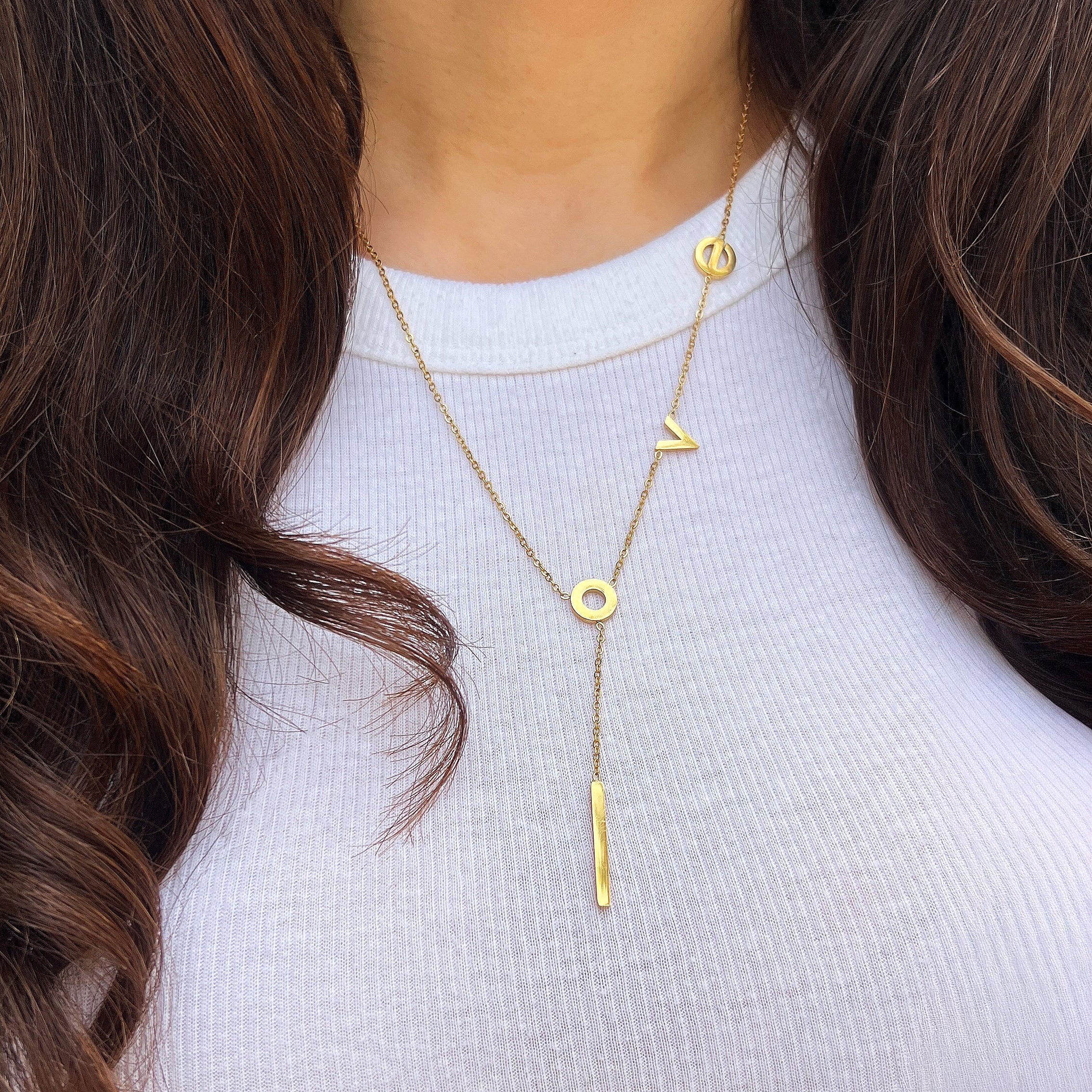 "I Love You" Lariat Necklace

Yellow Gold Plated
Letters: Approximately 0.33" Wide
Lariat Drop: 2.25" Long
17-19" Adjustable Length

While supplies last. All Deals Of The Day sales are FINAL SALE.