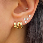 Wavy Triple Layer Huggie Pierced Earrings

Yellow Gold Plated Over Silver
0.43" Long X 0.47" Wide

While supplies last. All Deals Of The Day sales are FINAL SALE.