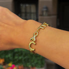 F Cancer Link Bracelet

Yellow Gold Plated

0.48" Wide
6.75" Length