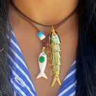 Large Textured Flex Turquoise Eye Fish Charm&nbsp;

Reel in some fun with our Flex Fish Charm! This flexible and texturized charm adds a playful touch to any accessory. No need to fish for compliments, they'll come swimming your way with this cute addition.

Yellow Gold Plated
2.5" Long x 0.66" Wide