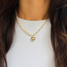 Pearl &amp; Paperclip Link Heart Pendant Necklace

Yellow Gold Plated
Pearls: 5MM
Heart: 0.43" Wide
15.5-17.5 Adjustable Length

While supplies last. All Deals Of The Day sales are FINAL SALE.