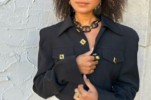 Women in Black Jacket with Gold buttons