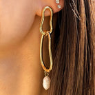 Freeform Freshwater Pearl Drop Pierced Earrings

Yellow Gold Plated
2.75" Long X 0.51" Wide


While supplies last. All Deals Of The Day sales are FINAL SALE.