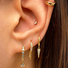 <p>CZ Bezel Drop Huggie Pierced Earrings</p> <ul> <li>Yellow Gold Plated Over Silver</li> <li>0.83" Long</li> <li>0.60" Diameter</li> </ul> <p>&nbsp;</p> <p><span style="color: #ff2a00;">While supplies last. All Deals Of The Day sales are FINAL SALE.</span></p>
