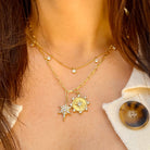 <p>CZ Sun &amp; Starburst Charm Necklace</p> <ul> <li>Yellow Gold Plated</li> <li>18-20" Length<br></li> <li>Starburst: 0.71" Long X 0.50" Wide</li> <li>Sun Disc: 0.71" Wide</li> </ul> <p><span style="color: #ff2a00;"><em>While supplies last. All Deals Of The Day sales are FINAL SALE.</em></span></p>