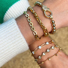 CZ Dangle Ball Chain Bracelet

Yellow Gold Plated
CZs: 0.11" Wide

6.25-7.25" Adjustable Length

While supplies last. All Deals Of The Day sales are FINAL SALE.