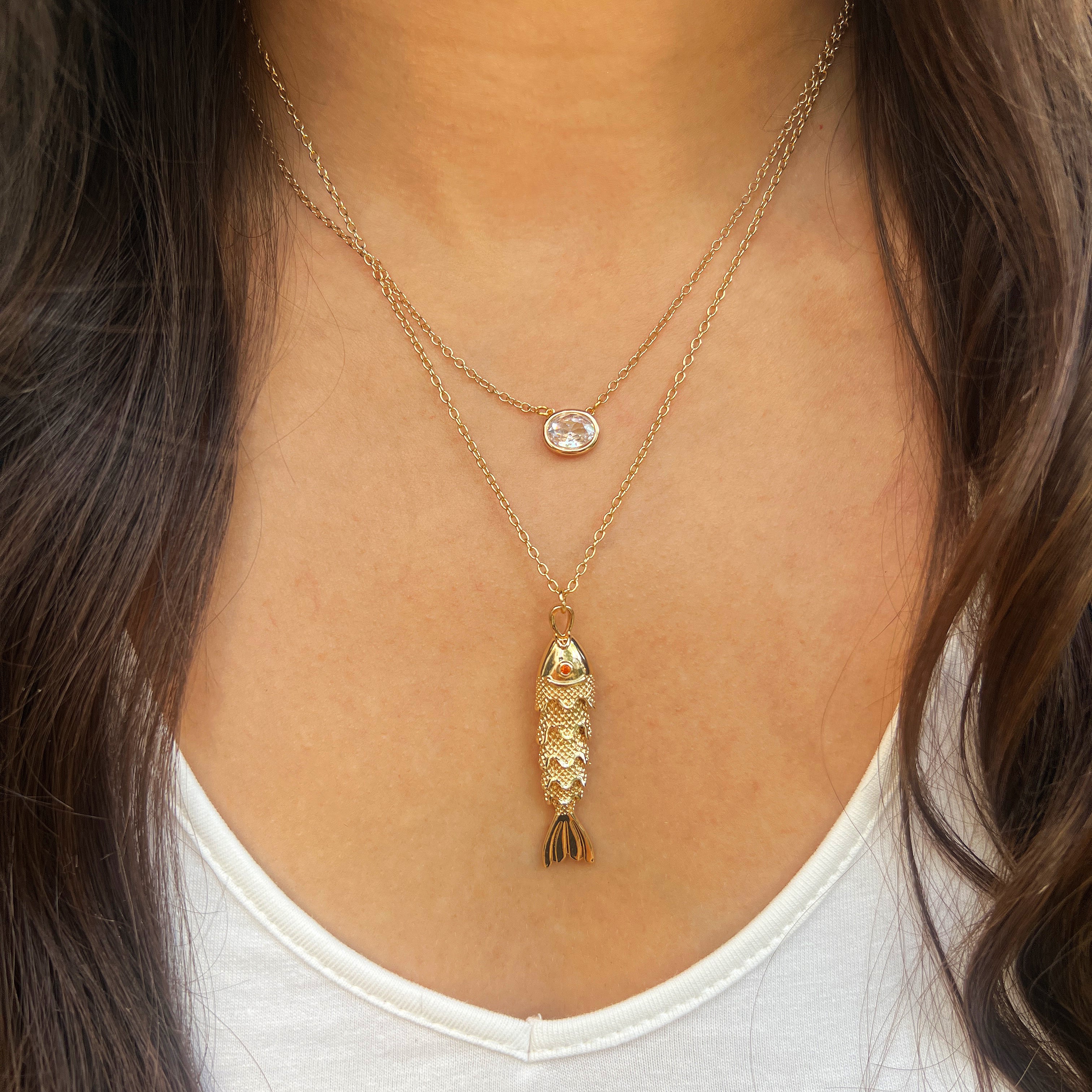 Fish Pendant Chain Necklace

Yellow Gold Plated
Fish: 1.77" Long X 0.35" Wide
17.5-19.5" Long

While Supplies last. All Deals Of The Day Sales are FINAL SALE.