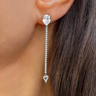 Cubic Zirconia Drop Earring worn on an ear.